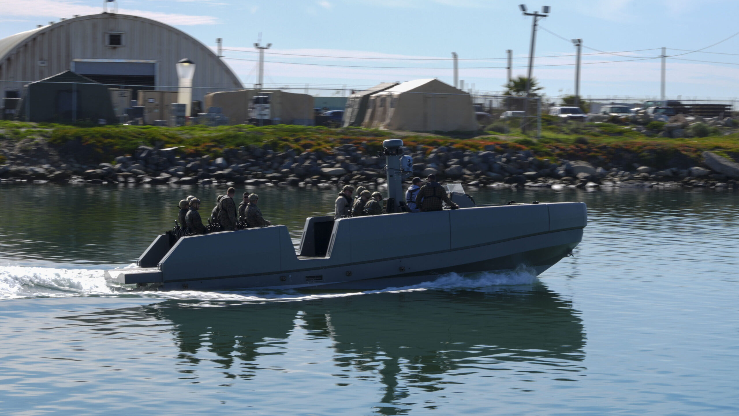 Marine scouts check out small boats from Down Under